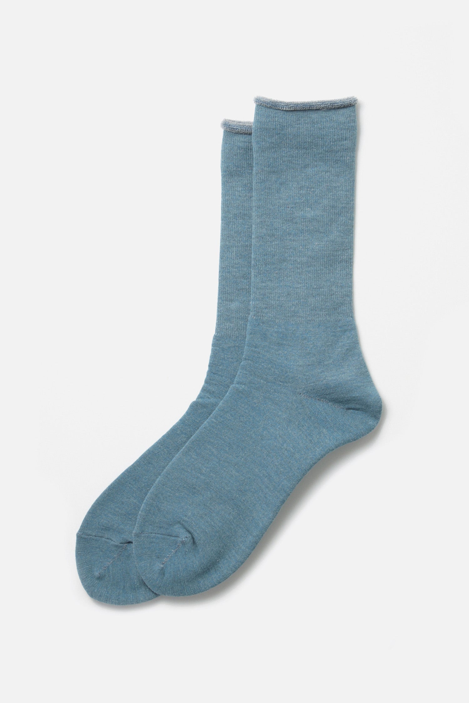 RoToTo City Socks / Light Blue Grey by RoToTo: a pair of light blue crew socks with subtle gray trim at the top, laid flat on a white background.