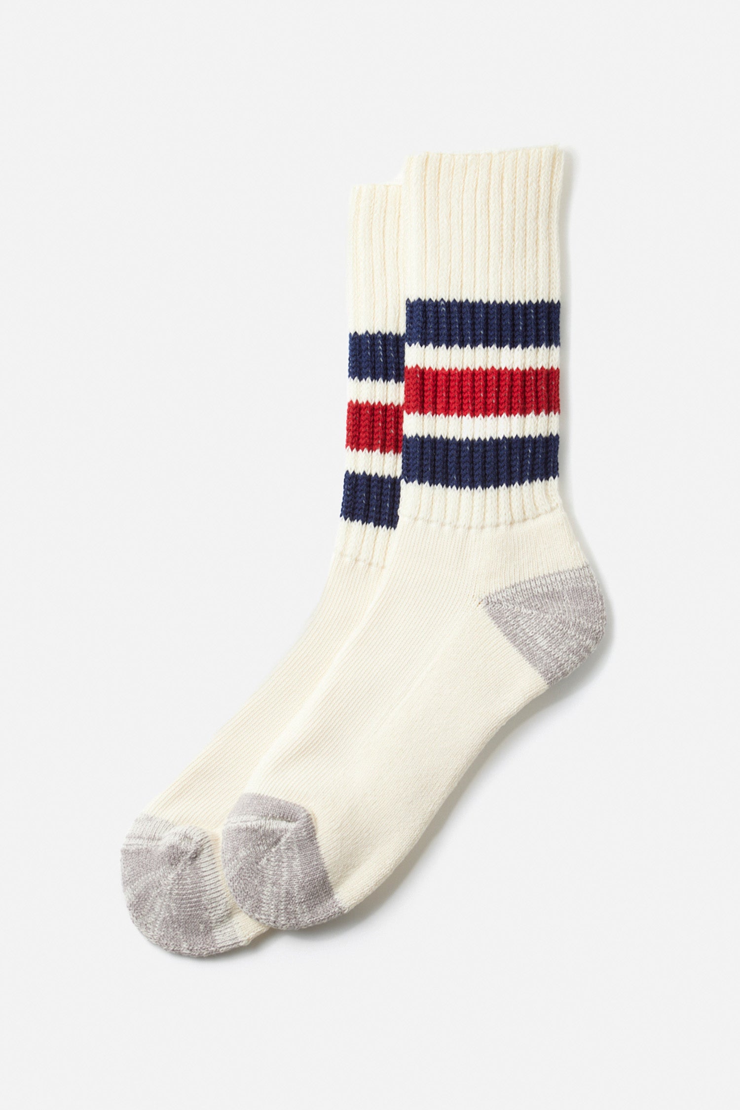 The RoToTo Coarse Ribbed Old School Socks in Navy Dark Red, by RoToTo, feature two navy and two red stripes near the cuffs, light gray heels and toes, are made in Japan, and are shown on a plain white background.