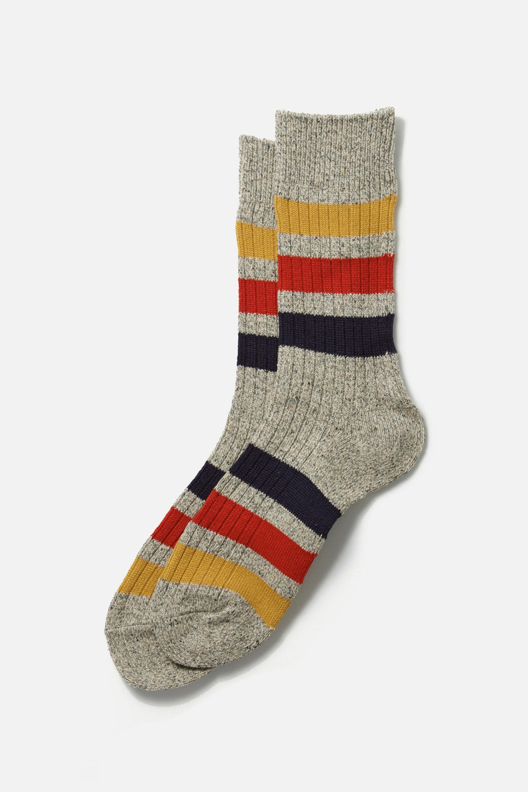 A pair of RoToTo Park Stripe Crew Socks in Medium Grey with horizontal stripes in red, navy blue, yellow, and orange is laid flat on a white background.