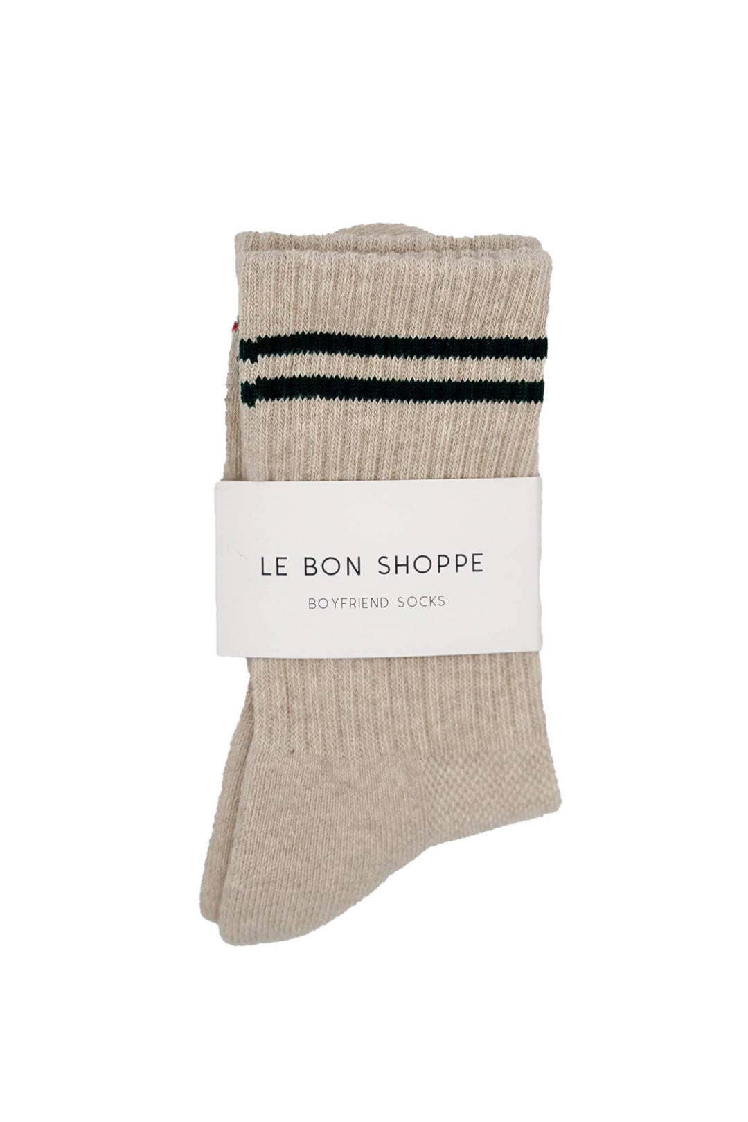A pair of Le Bon Shoppe Boyfriend Socks in Oatmeal with two black stripes and a white LE BON SHOPPE label—ideal for anyone wanting cute, sporty socks. Shown folded on a plain white background.
