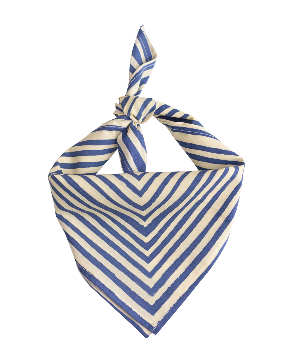 The Handker Bandanas No. 015 Sammie Bandana by Handker Bandanas features blue and white diagonal stripes in a V-shape, is hand screen-printed on cotton, measures 22x22 inches, and is displayed knotted against a white background.