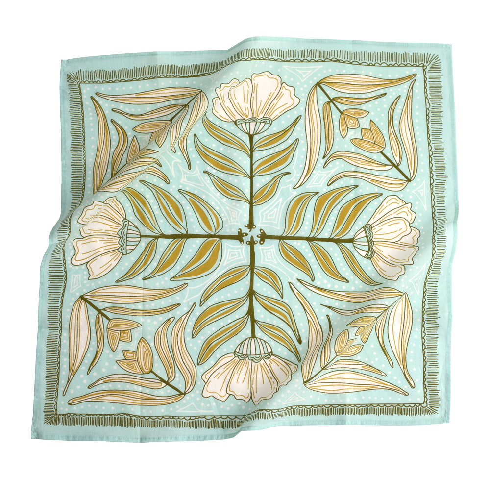 The Handker Bandanas - No. 012 Eliza Bandana by Handker Bandanas features a symmetrical floral print in green, gold, and white on light blue with large flowers, leafy branches, and decorative botanical borders.