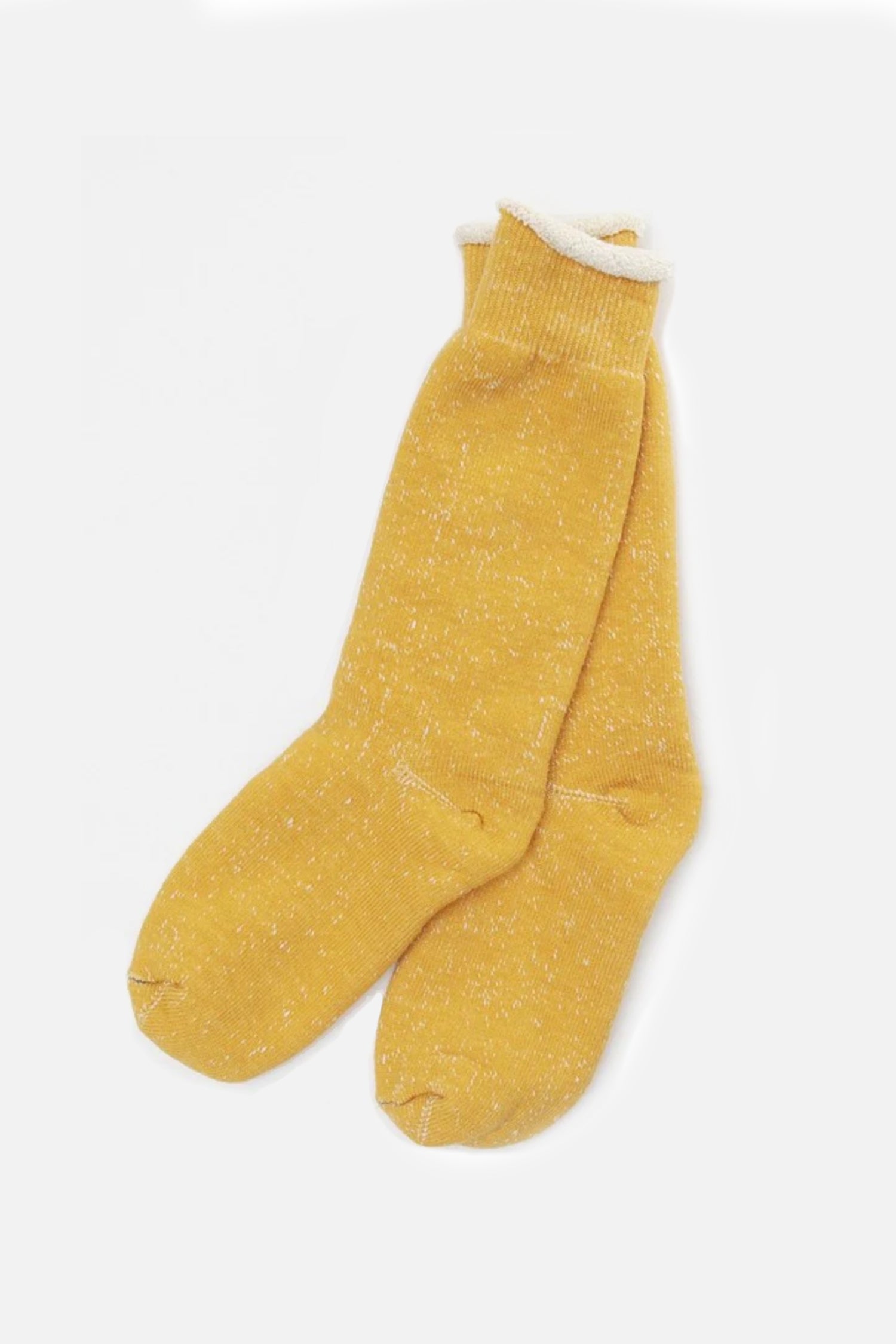 A pair of RoToTo Double Face Crew Socks in yellow from RoToTo, featuring cozy merino wool and a slightly rolled cuff, laid flat on a plain white background.