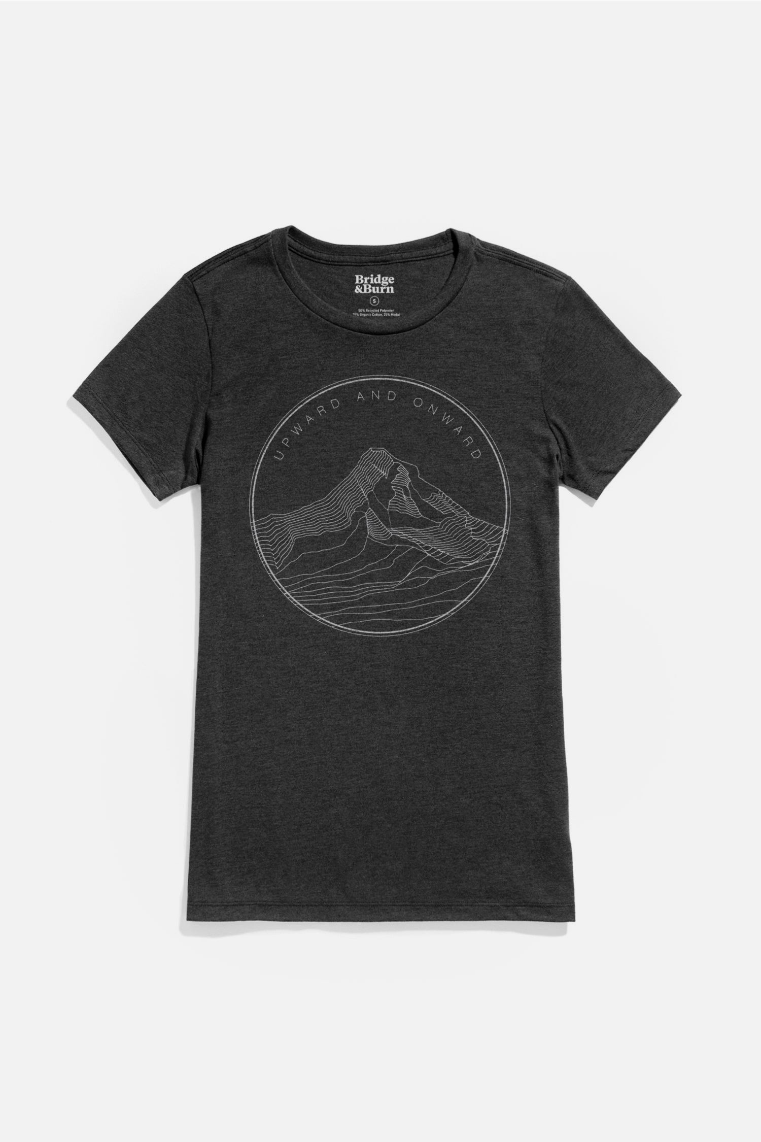 The Bridge & Burn Women's Upward and Onward Tee in black is made from organic cotton and features a circular line drawing of mountains and waves with "UPWARD AND ONWARD" above the illustration.