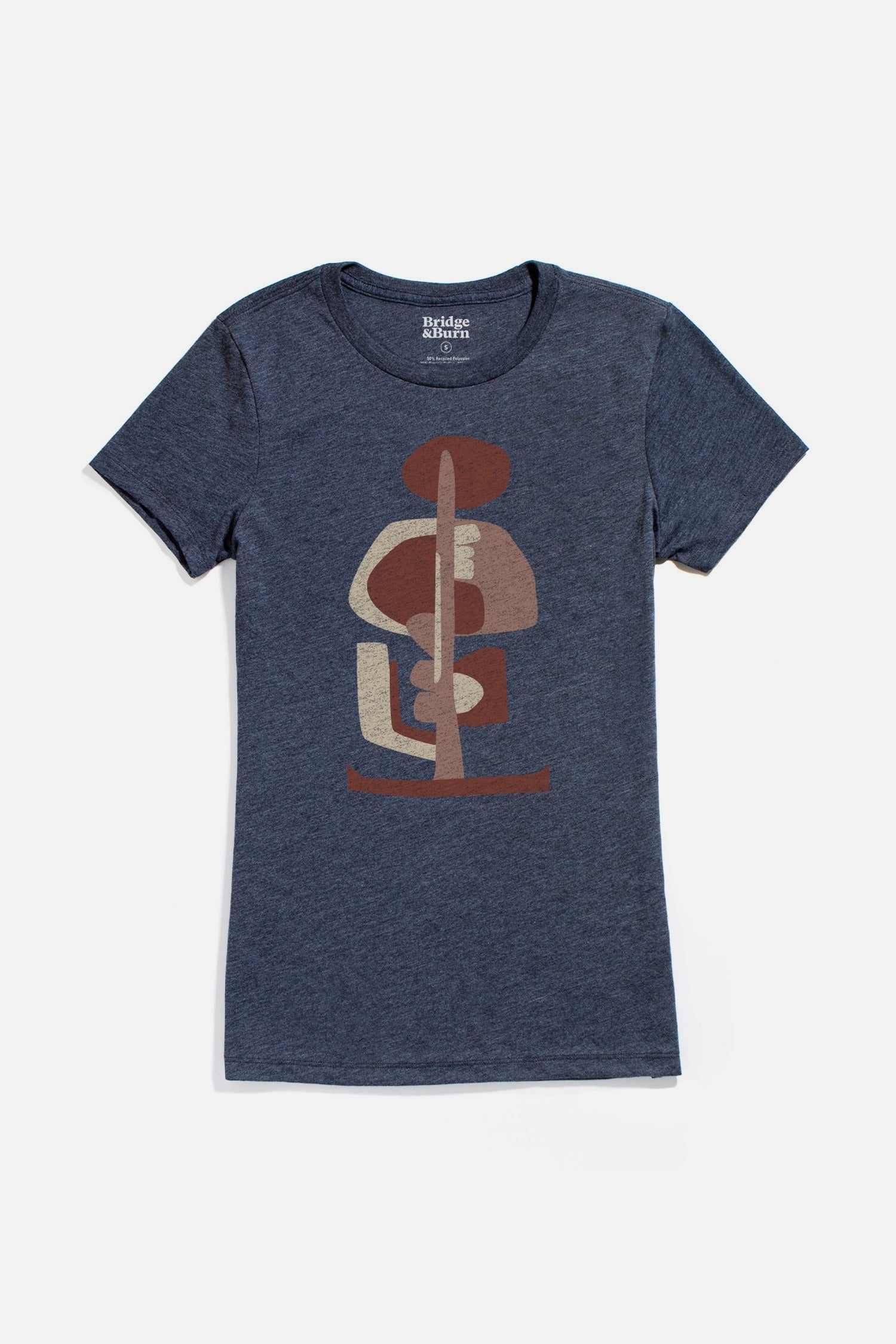 The Bridge & Burn Women's Tallest Tree Tee in navy is an organic cotton, short-sleeve shirt with a stacked geometric design in beige, brown, and red on the front. The eco-friendly tee is shown laid flat on a white background.