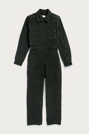 The Bridge & Burn Faye Jumpsuit in Deep Pine Pinwale is a pinwale corduroy workwear style with a collar, front zipper, chest pocket, and straight legs, laid flat on a white background.