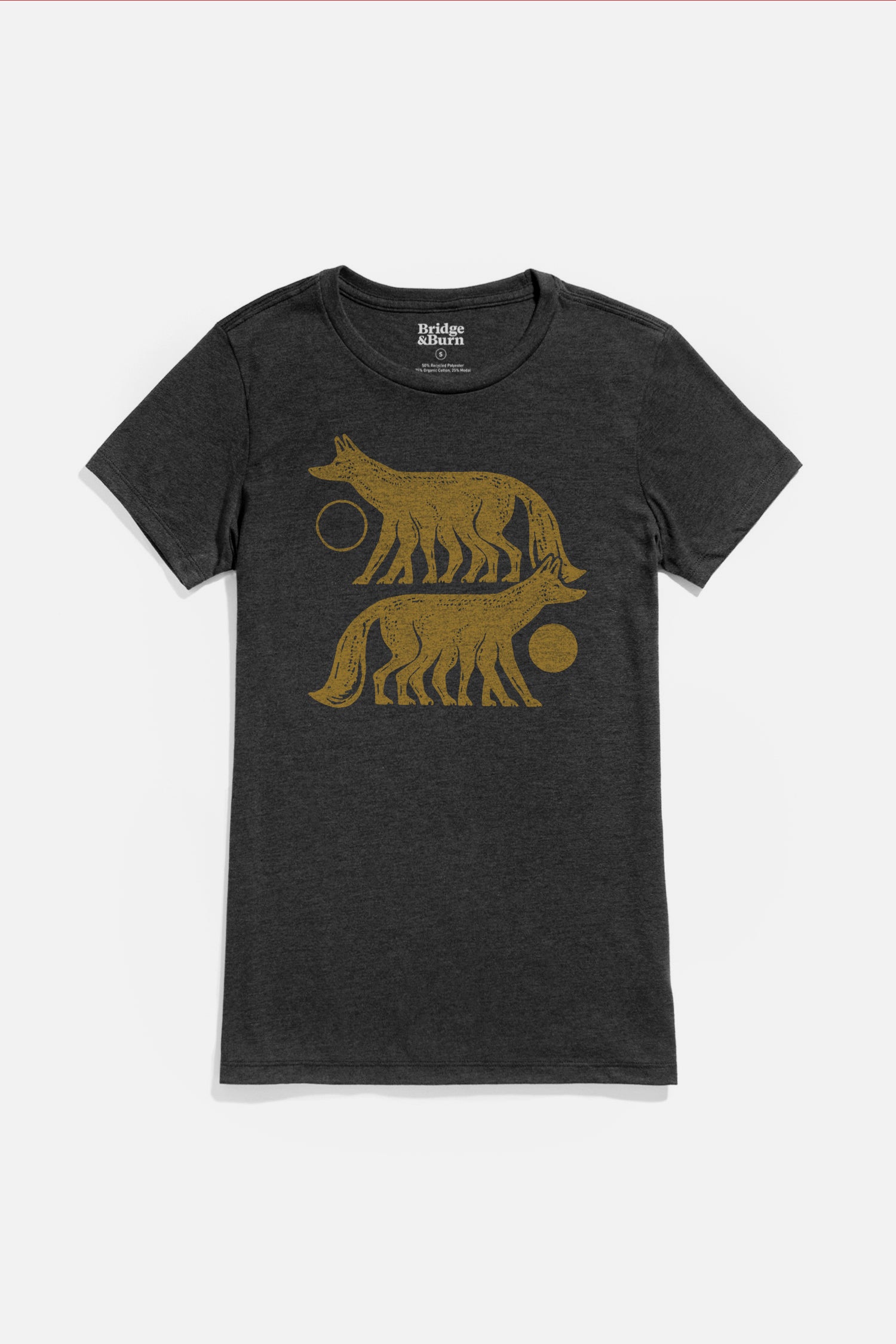The Bridge & Burn Women's Night Watch Tee in black is an organic cotton shirt featuring two stylized yellow five-legged foxes with circular accents near their heads printed on the front.