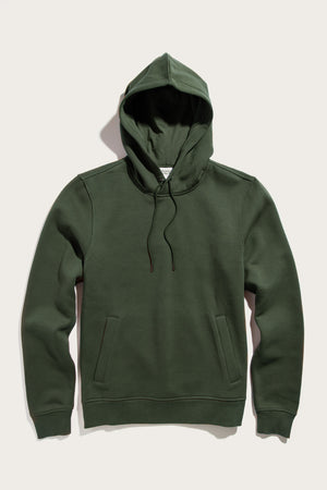The Williams Pullover Hoodie in Forest Night by Bridge & Burn, made from recycled polyester, features a drawstring hood and front pockets. Shown laid flat on a light background.