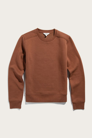 The Bailey Crew Sweatshirt in Burnt Umber by Bridge & Burn is a sustainable, soft organic cotton crewneck with long sleeves, ribbed cuffs and waistband, shown flat on a light background.