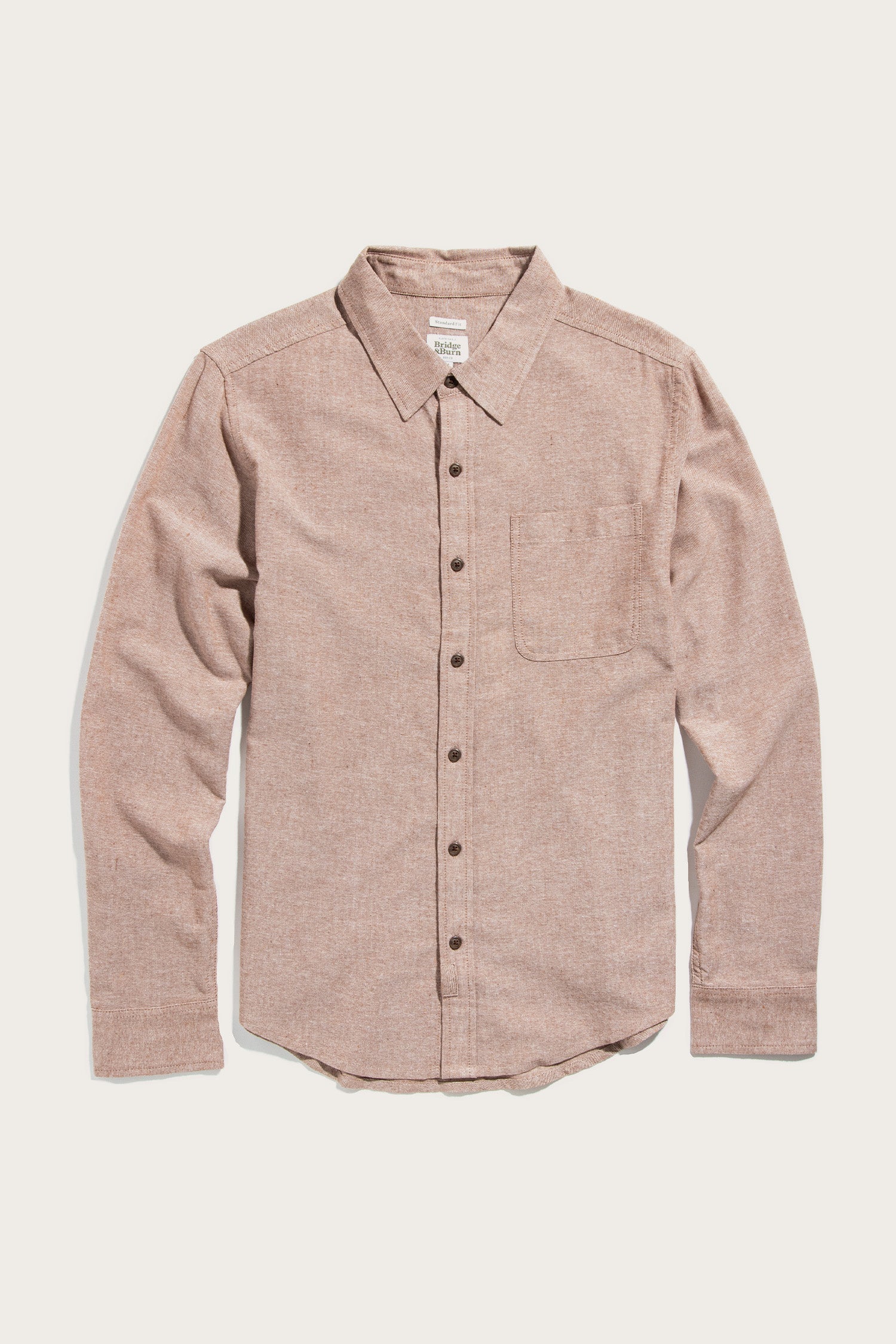 The Bridge & Burn Larson Shirt in Rust Chambray is a classic fit men's button-up, crafted from recycled cotton with a single chest pocket, shown laid flat on a plain white background.