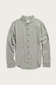 The Bridge & Burn Larson Shirt in Sage Chambray is a men’s classic fit casual button-up with a single chest pocket, dark buttons, and a classic collar. Shown laid flat on a plain white background.