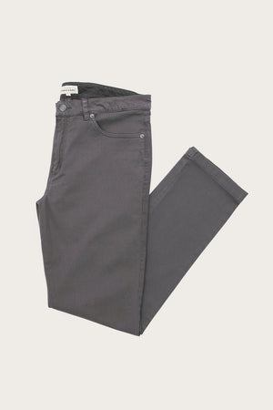 The Bridge & Burn Polk Pant in Charcoal, neatly folded with one leg crossed over the other, is displayed on a plain white background.