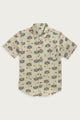 The Bridge & Burn Harbor Slim Shirt / Aloha Floral is a short-sleeve, button-up shirt in linen-cotton, featuring a light beige base with dark blue fan leaves, red flowers, a collar, and a relaxed fit for easy comfort.
