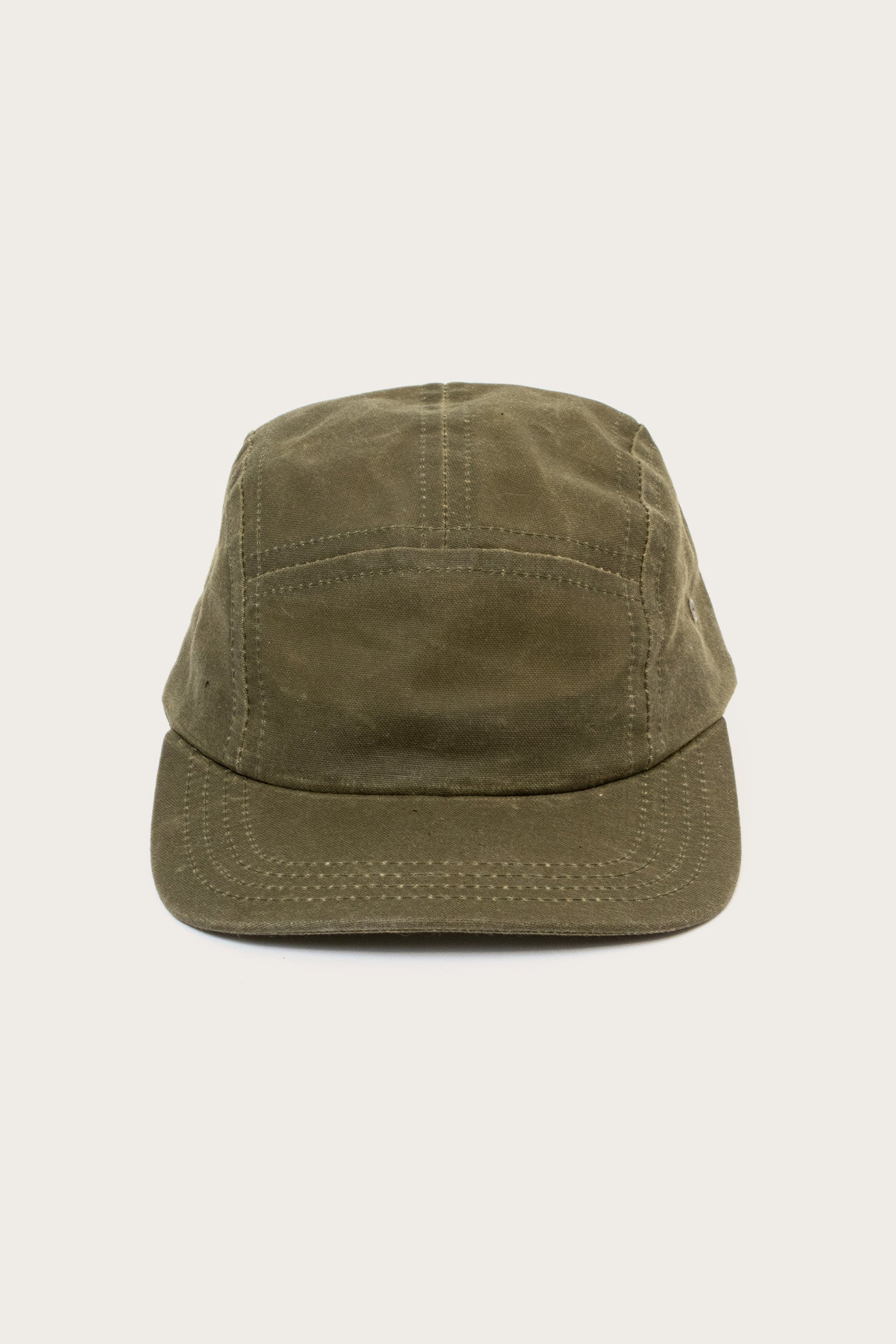 Front view of the Bridge & Burn Camper Waxed 5 Panel Cap in Moss, featuring visible stitching, made in the USA, displayed against a plain light background.