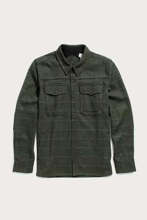The Bridge & Burn Fielding Shirt Jacket in Cypress Windowpane is a cozy wool overshirt with long sleeves, two buttoned chest flap pockets, and a classic collar—ideal for workwear and laid flat on a light background.