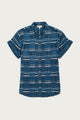 The Bridge & Burn Bea Shirt in Stormcrest Stripe features a blue base with white and gray stripes, a classic collar, short sleeves, and rolled cuffs. Displayed flat on a light background.