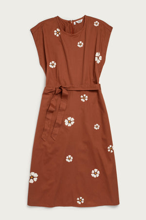 The Eloise Dress by Bridge & Burn in Redstone Bloom features an A-line silhouette, short sleeves, belted waist, white floral print, round neckline, back zipper, and knee-length cut—all in 100% cotton for essential everyday style.