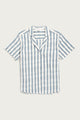 The Wren Shirt / Beach Stripe by Bridge & Burn is a relaxed-fit, short-sleeve cotton shirt with blue and white stripes, notched collar, and retro style—shown laid flat on a plain background.