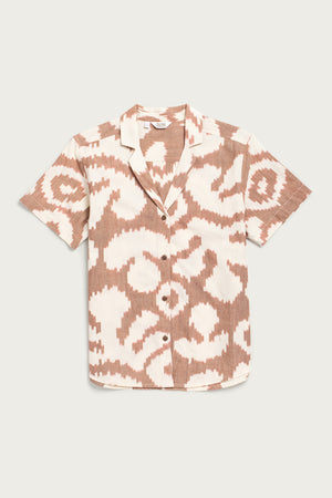 The Bridge & Burn Wren Shirt / Pop Leaf is a short-sleeve, button-up cotton shirt with a relaxed collar and beige and white abstract ikat design—perfect for casual style and cool summer comfort.