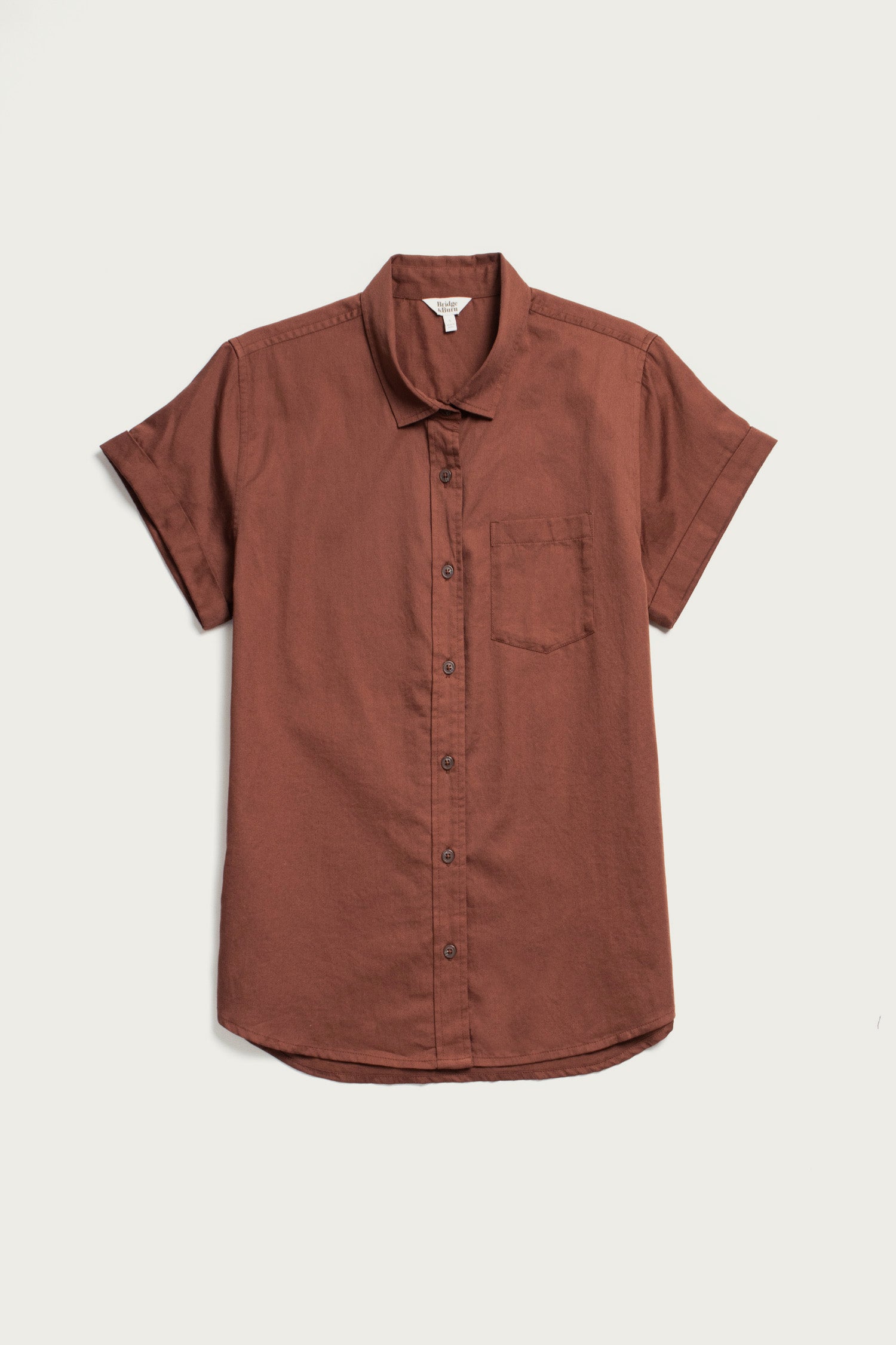 The Bridge & Burn Bea Shirt in Copper is a tailored-fit, short-sleeve button-down with a single chest pocket, shown laid flat on a white background.