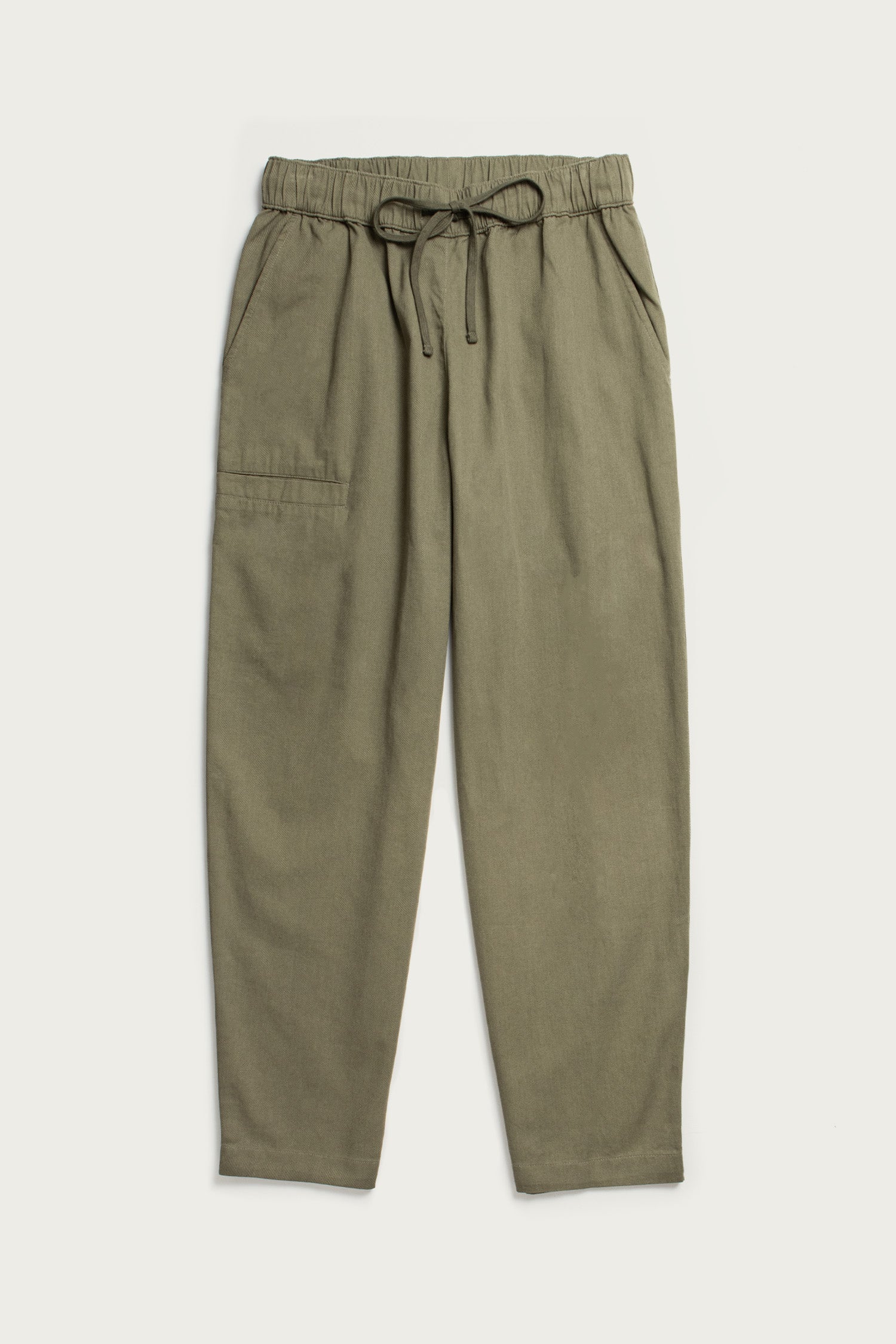 Bridge & Burn's Lark Pant in olive, made from organic cotton, features an elastic waistband, side pockets, and a relaxed fit, shown laid flat on a light background.