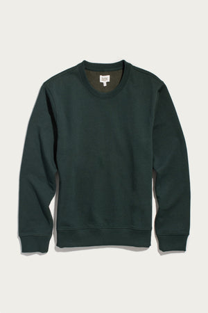A Hayden Crew Sweatshirt in Juniper by Bridge & Burn, featuring a dark green hue, crew neck, and long sleeves, crafted from recycled cotton and displayed flat on a white background.