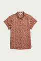 The Bea Shirt / Desert Rain by Bridge & Burn is a rust-colored, short-sleeve organic cotton button-down with scattered white and black lines, shown flat on a plain white background.