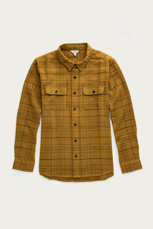 The Bridge & Burn Lenon Shirt in Golden Horizon Plaid is a mustard yellow, long-sleeve over-shirt with a black plaid pattern, front chest flap pockets, and a pointed collar, shown laid flat on a white background.