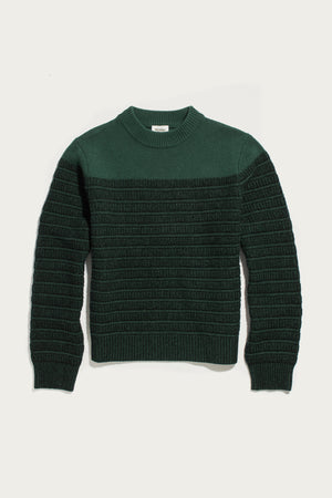 The Sabine Sweater in Pine Shadow by Bridge & Burn, a heavyweight merino wool knit with a ribbed texture and crew neckline, is shown laid flat on a white background.