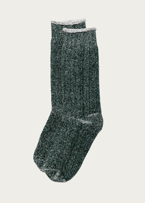 A pair of American Trench - Sunday Sock in bottle green, thick terry knit with white trim at the cuffs, lies flat against a plain white background.