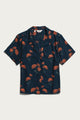 Bridge & Burn's Mila Cropped Shirt in the Wildflower print—a short-sleeve, collared navy button-up crafted from modal and adorned with a scattered pattern of red-orange flowers and green stems—is shown laid flat on a white background.
