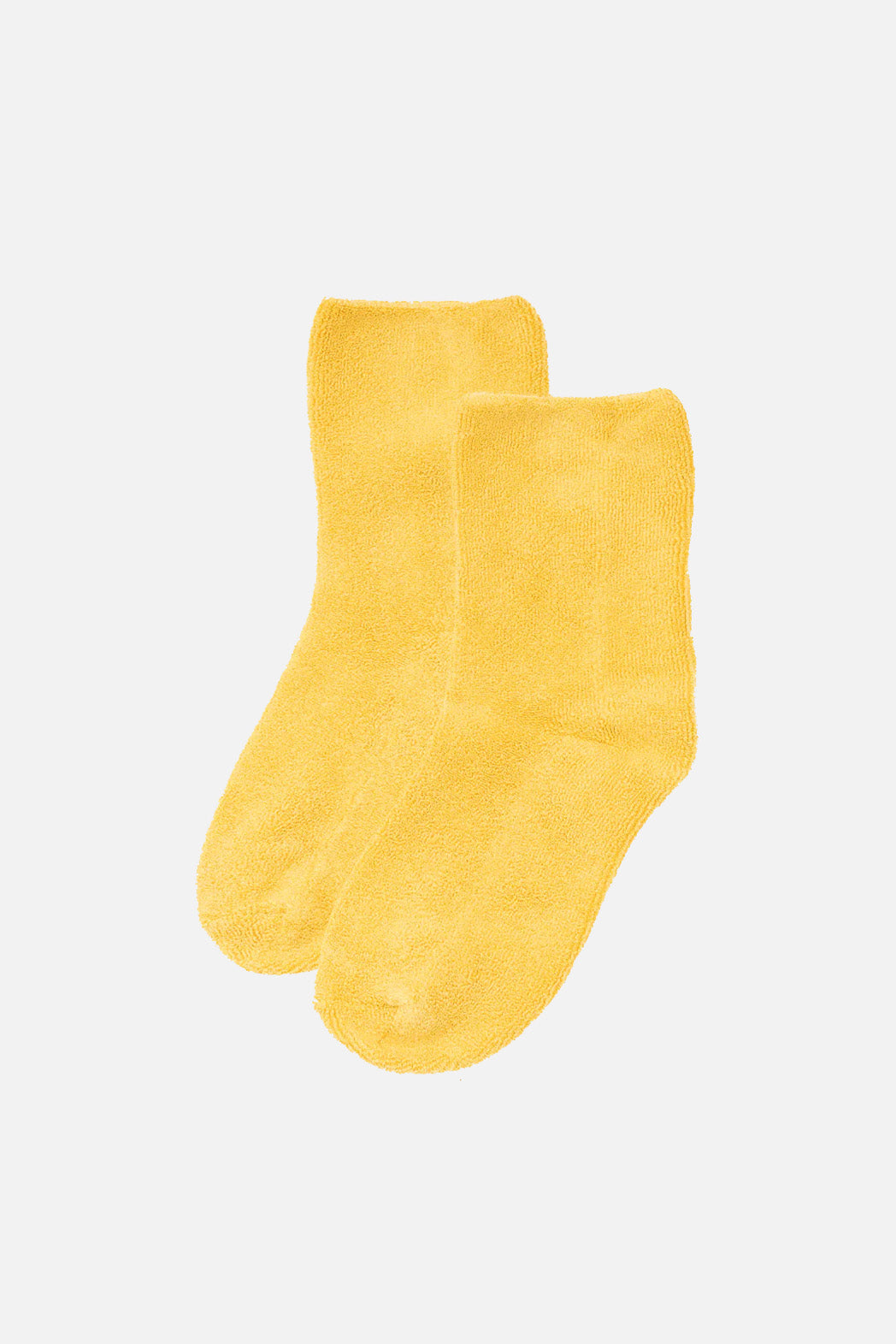 A pair of Le Bon Cloud Socks in Honey by Le Bon, crafted from US-grown cotton terry knit, displayed side by side on a plain white background.