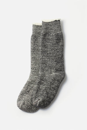 A pair of RoToTo Double Face Crew Socks in charcoal, made in Japan with ribbed cuffs, are laid side by side on a plain white background.