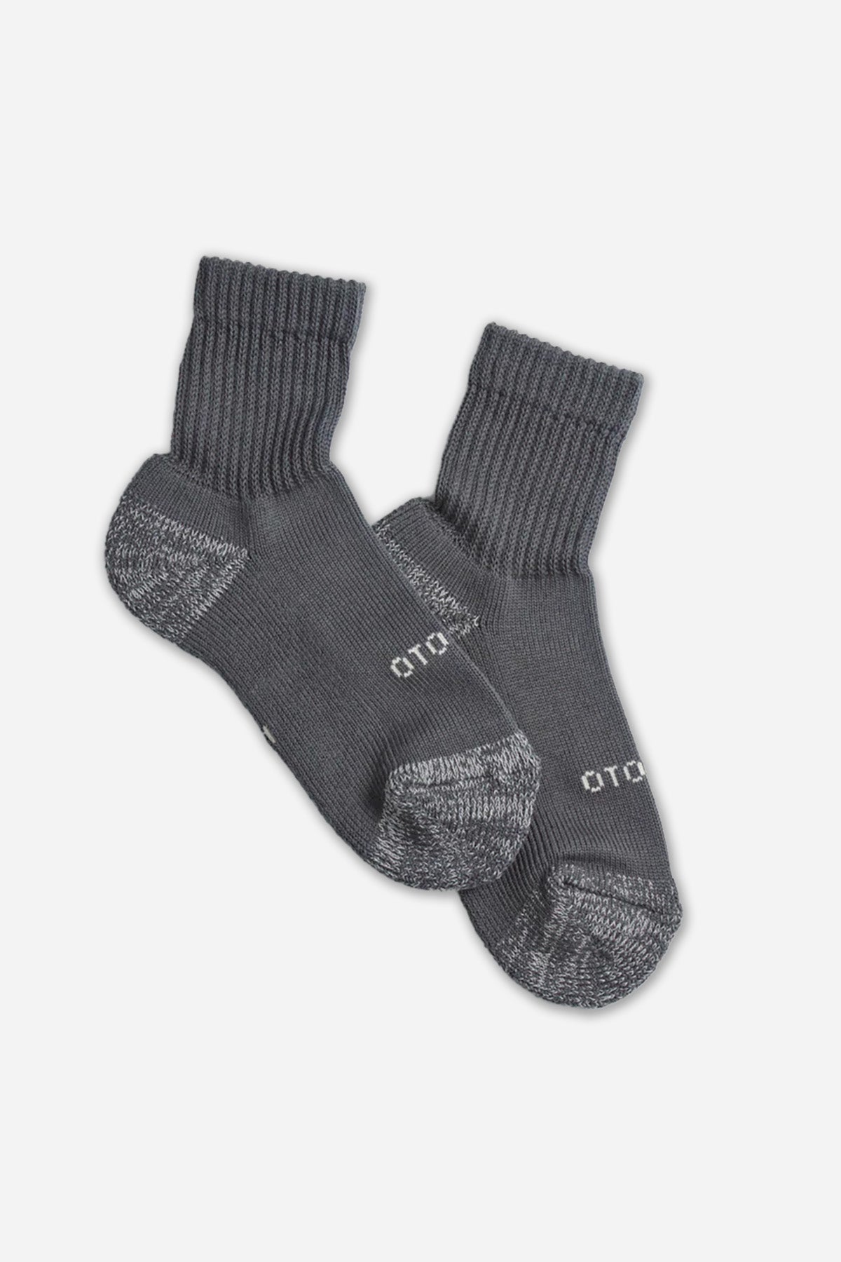 The RoToTo Everyday Mini Pile Crew Sock in Charcoal by RoToTo is an organic cotton pair with ribbed cuffs and reinforced heels and toes, shown lying flat on a plain white background.