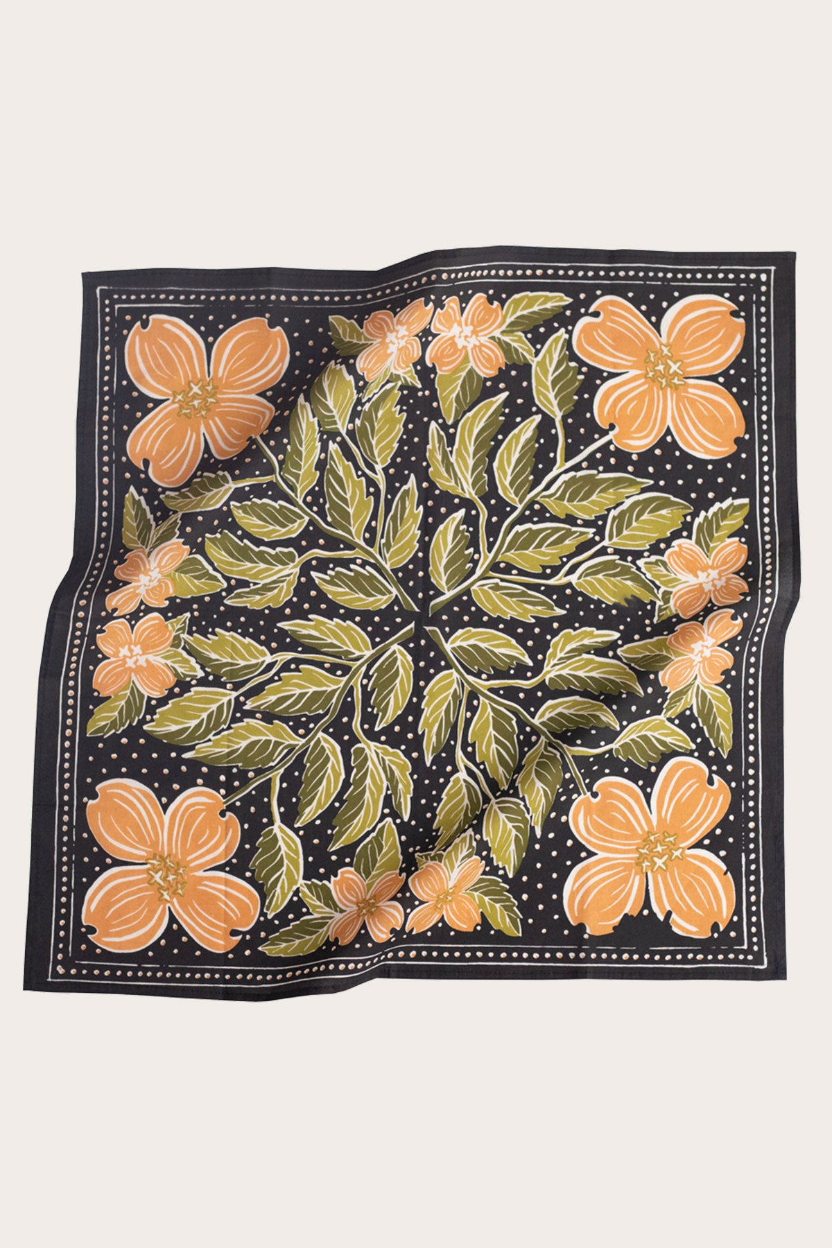 The Handker Bandanas - No. 046 Amy Bandana from Handker Bandanas features large orange dogwood flowers with green leaves on a black background, accented by white dots and a thin white border.