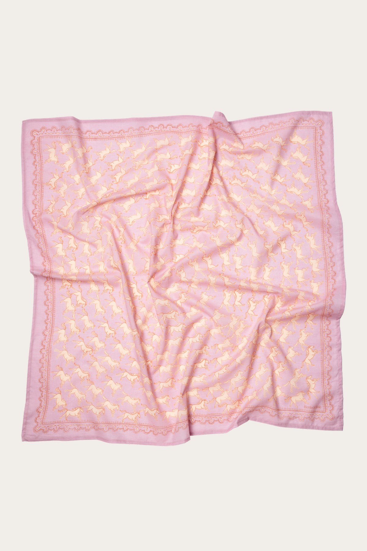 The Handker Bandanas 34" Wild Rag Horses Bandana features a pink cotton lawn fabric with a repeated yellow horse pattern and detailed pink border, displayed flat. Brand: Handker Bandanas.