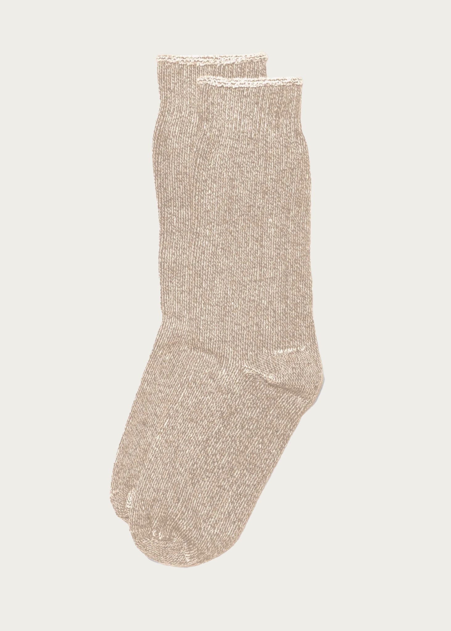 The American Trench Sunday Sock in Khaki is a cozy, ribbed crew sock shown laid flat on a neutral background—perfect for relaxing in style.