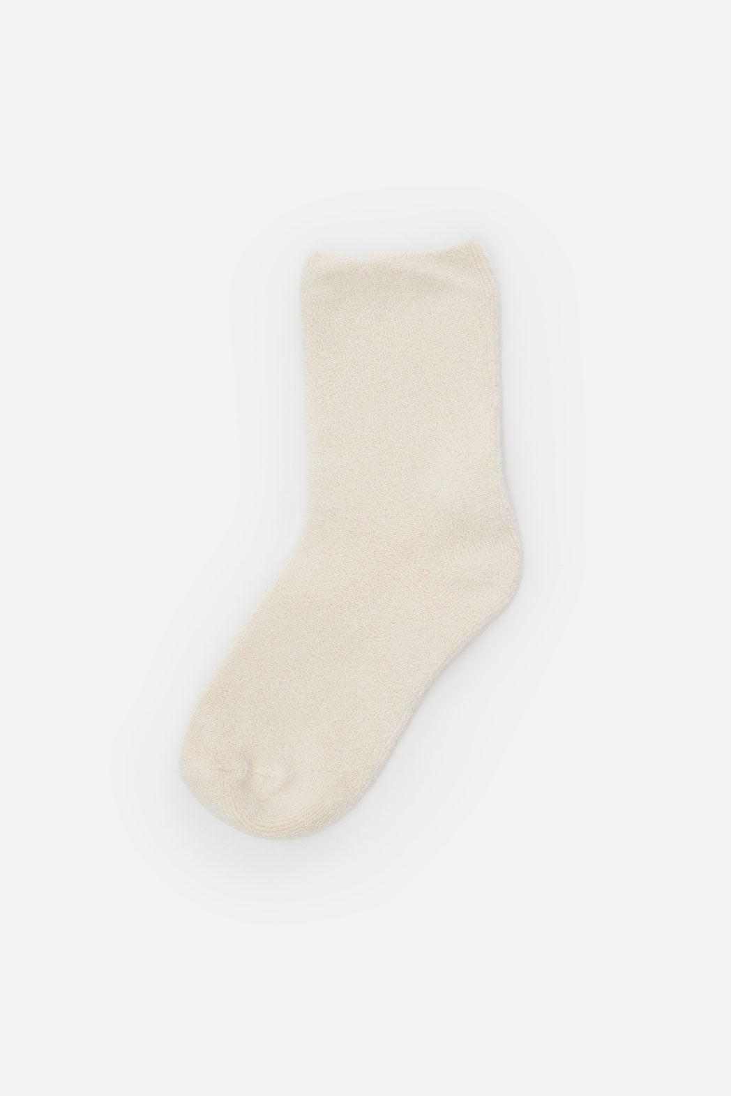A single Le Bon Cloud Sock in Ecru, ankle-length and crafted from US-grown cotton, lies flat on a plain white background.