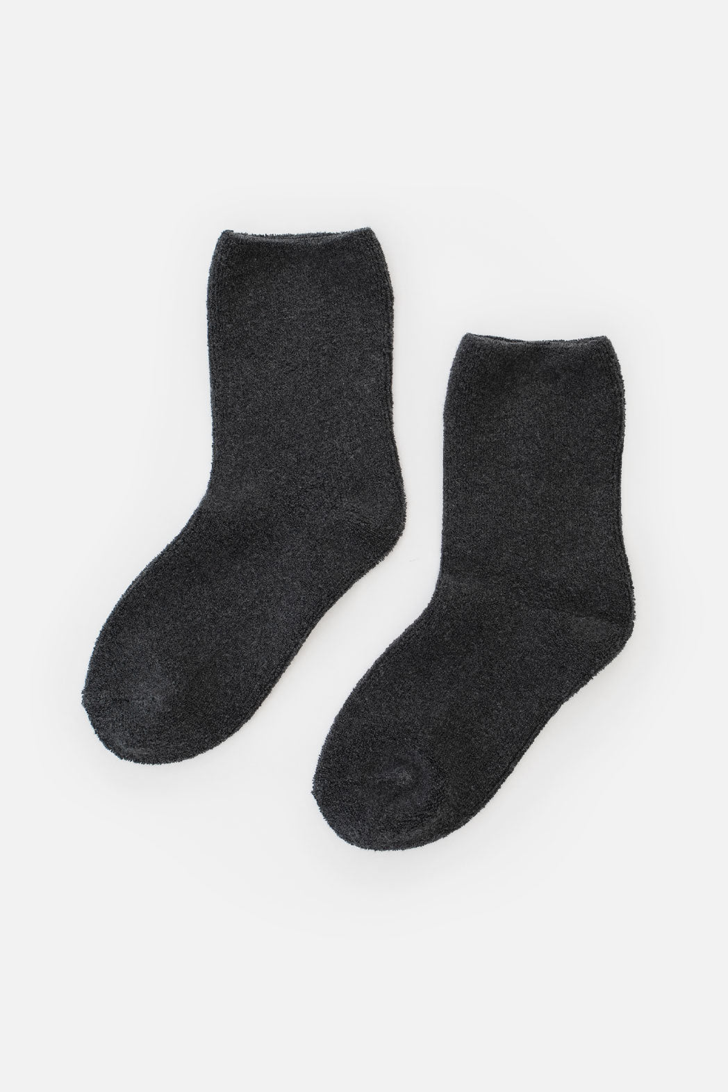 A pair of Le Bon Cloud Socks in Charcoal, made from US-grown cotton, are laid side by side on a white background.