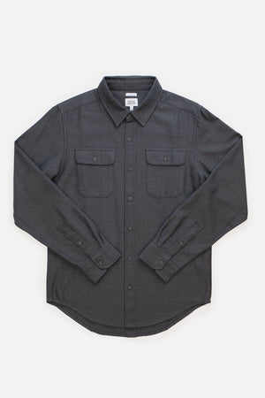 Bridge & Burn’s Bedford Shirt in Charcoal Herringbone is a men’s long-sleeve overshirt with two chest pockets and a collar, shown laid flat on a white background.